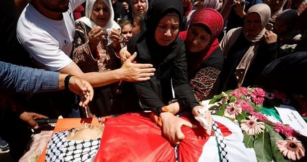 Thousands march in funeral of martyr Abu Alia