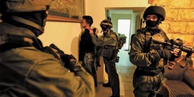 IOF arrest 21 Palestinians in overnight raids