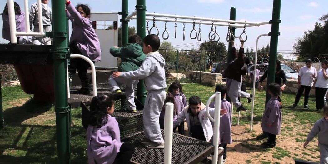 Settlers attempt to destroy children�s playing ground in a village southwest of Hebron