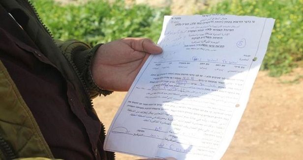 Israeli army delivers stop-work orders against 11 homes in Jericho