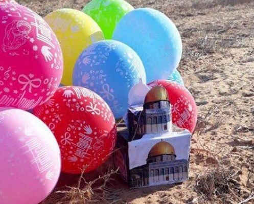 Cluster of incendiary balloons lands in southern Israel
