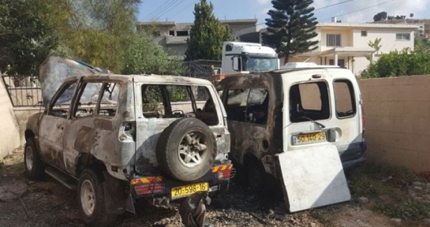 Israeli terrorists vandalize Palestinian cars, paint death to Arabs