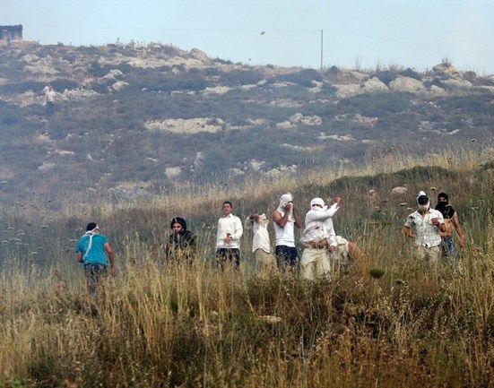 Israeli forces, settlers attack Palestinians in Ramallah village