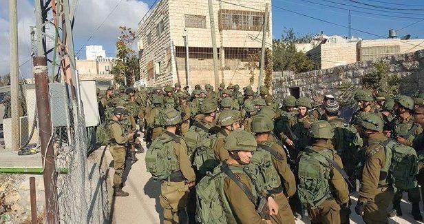 Palestinians protest at erecting Israeli gate before school