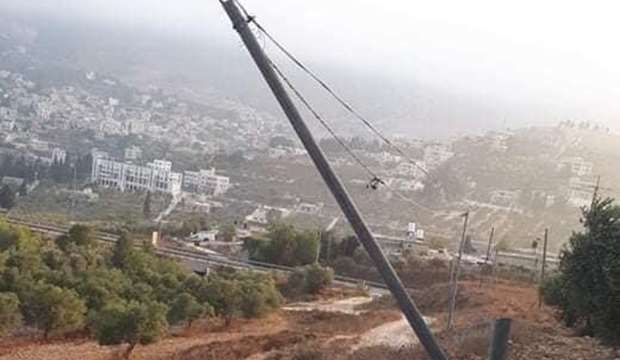Settlers destroy telephone poles, olive trees in Burin town