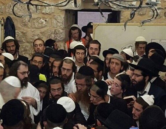 Israeli settlers perform religious rituals near Hebron