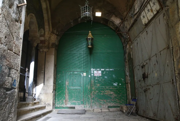 Praying outside Church of the Holy Sepulchre, but unable to enter