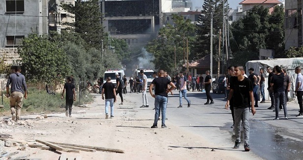 Dozens of Palestinians injured in Qalqilya military raid