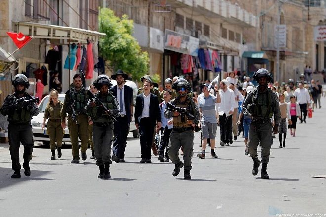 Israel lets settlers spend Passover at former outpost where Palestinian landowners remain excluded