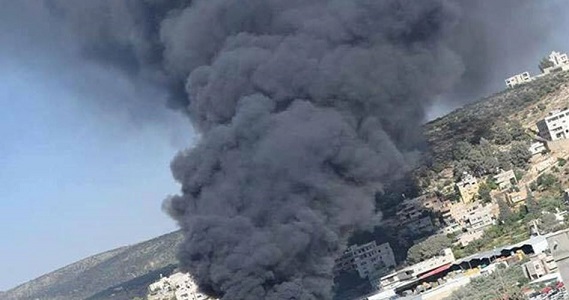 Huge fire breaks out in Beita town because of Israeli grenades