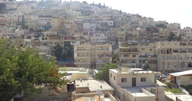 Palestinian youths throw Molotov cocktails at police forces in Silwan