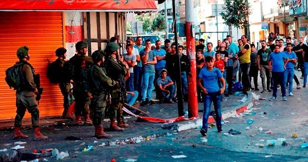 School students suffer from suffocation in IOF teargas attack