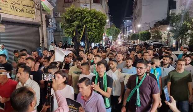 Thousands march in W. Bank to protest Israeli aggression against Gaza