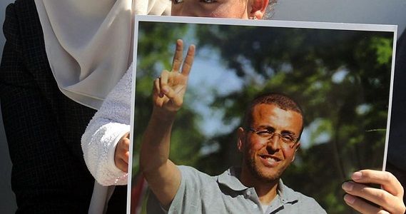 Hunger-striking journalist Mohamed Qiq transferred to hospital