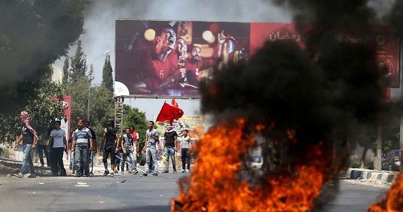 Qalandiya protesters speak up for hunger strikers in Israeli jail
