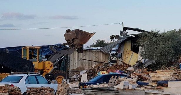 Israeli forces raze metal wall east of Occupied Jerusalem