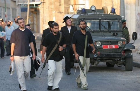 A settler living in an illegal outpost issues orders to demolish Palestinian homes