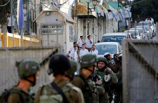 Israel forces break arm of Palestinian woman as she attempts to prevent arrest of son