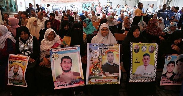 Palestinian sentenced to 21 years, nine others held administratively