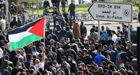 Palestinians in Israel chant 'Jerusalem is red line' during flag march