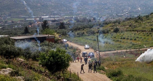Three Palestinians injured, dozens suffered from teargas in IOF raids