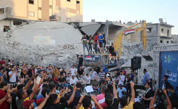 Palestinians rally for Gaza rebuilding, ending Israel siege