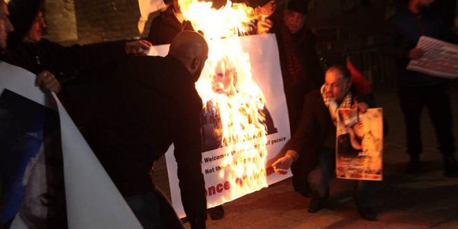 Palestinians burn photos of Pence ahead of his visit to Israel