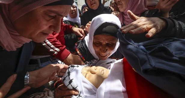 Thousands march in funeral of martyr Ghufran Warasnah