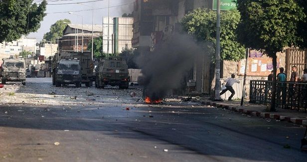 Dozens injured in West Bank clashes