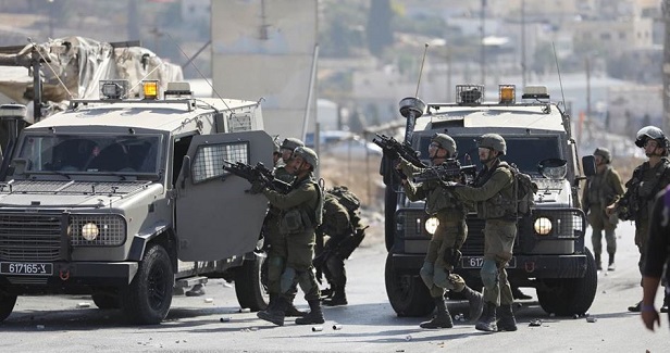 Injuries, arrests reported in overnight IOF, settlers' raids