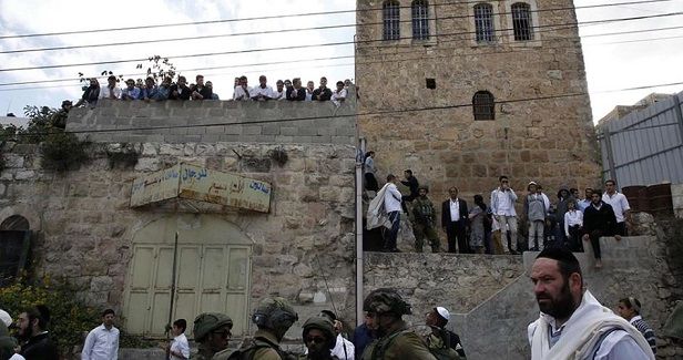 Palestinian father and son injured in settler attack