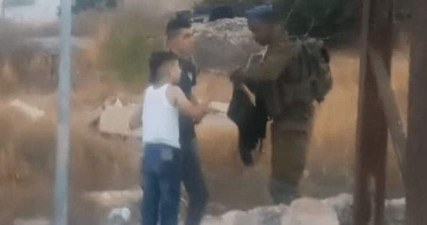 Palestinian children forced to disrobe at Israeli checkpoint