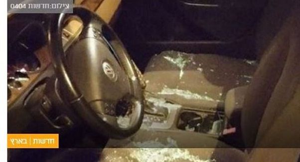 Palestinian youths throw stones at settlers cars south of Bethlehem