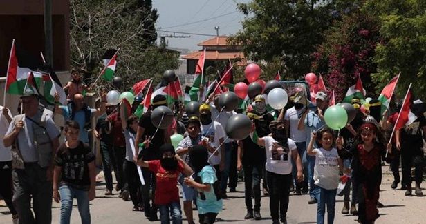 Palestinians organize rally in protest at settlers� flag march