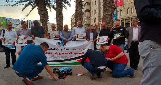 Journalists protest IOF�s killing of photojournalist in Gaza