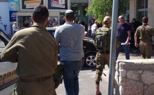 Palestinian shot, wounded in alleged stabbing attack