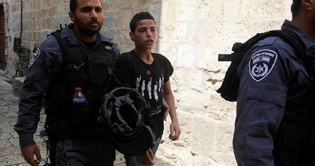 Israeli policemen arrest wounded child in hospital