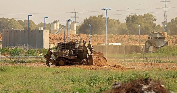 Israeli military bulldozers level land in northern Gaza