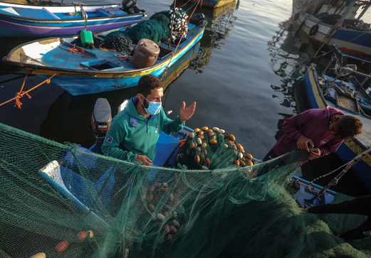 Israel eases restrictions on Gaza, expands fishing zone