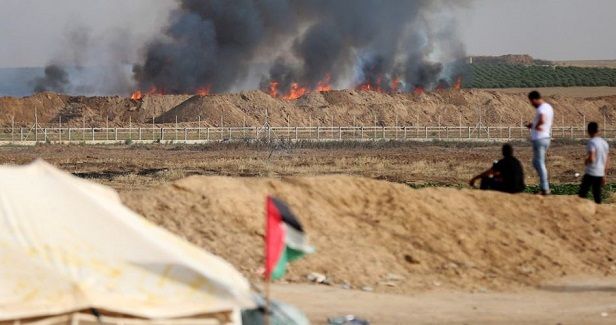 Palestinian youths launched 17 flaming kites Tuesday