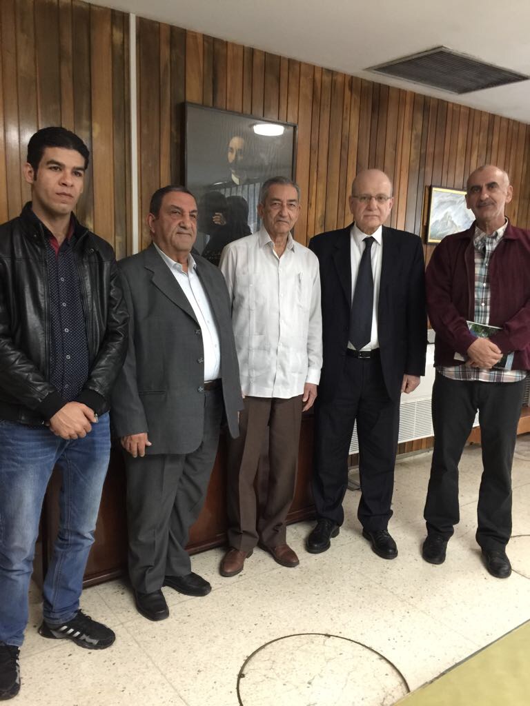 The DFLP delegation meets an official in the Cuban Communist Party