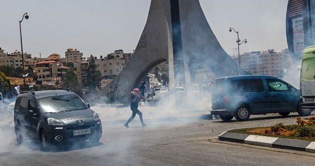 Nine Palestinian citizens injured in IOF raid into al-Bireh