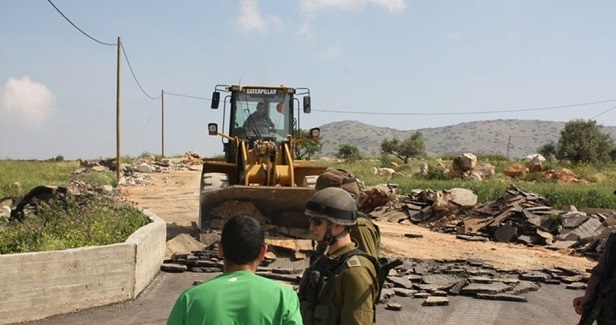 IOF razes road, orders halt to construction of structures in W. Bank