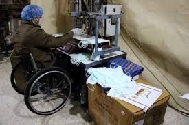 Palestinian shoemaker behind West Bank's only mask factory