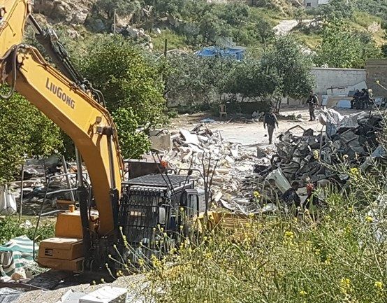 Israeli forces attack Palestinian family, demolish two Silwan homes