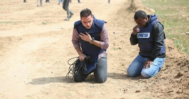 March in protest at targeting Palestinian journalists