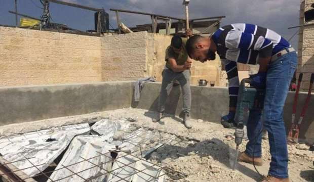 Palestinian family forced to self-demolish commercial facilities