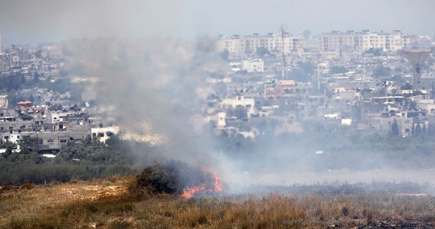 Settler lands on fire by flaming kites near Gaza border