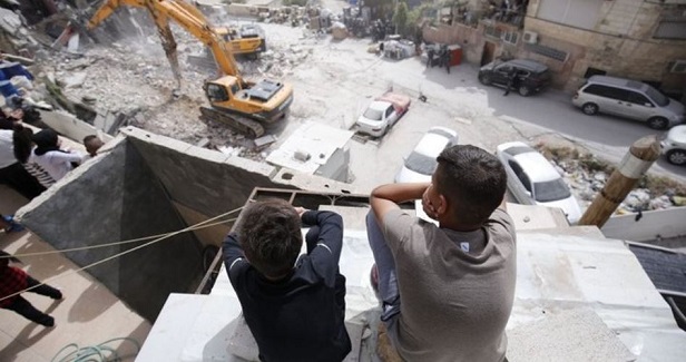 Two Palestinian families forced to self-demolish own houses