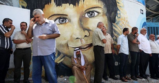 employees in Gaza hold protest strike over US aid cuts